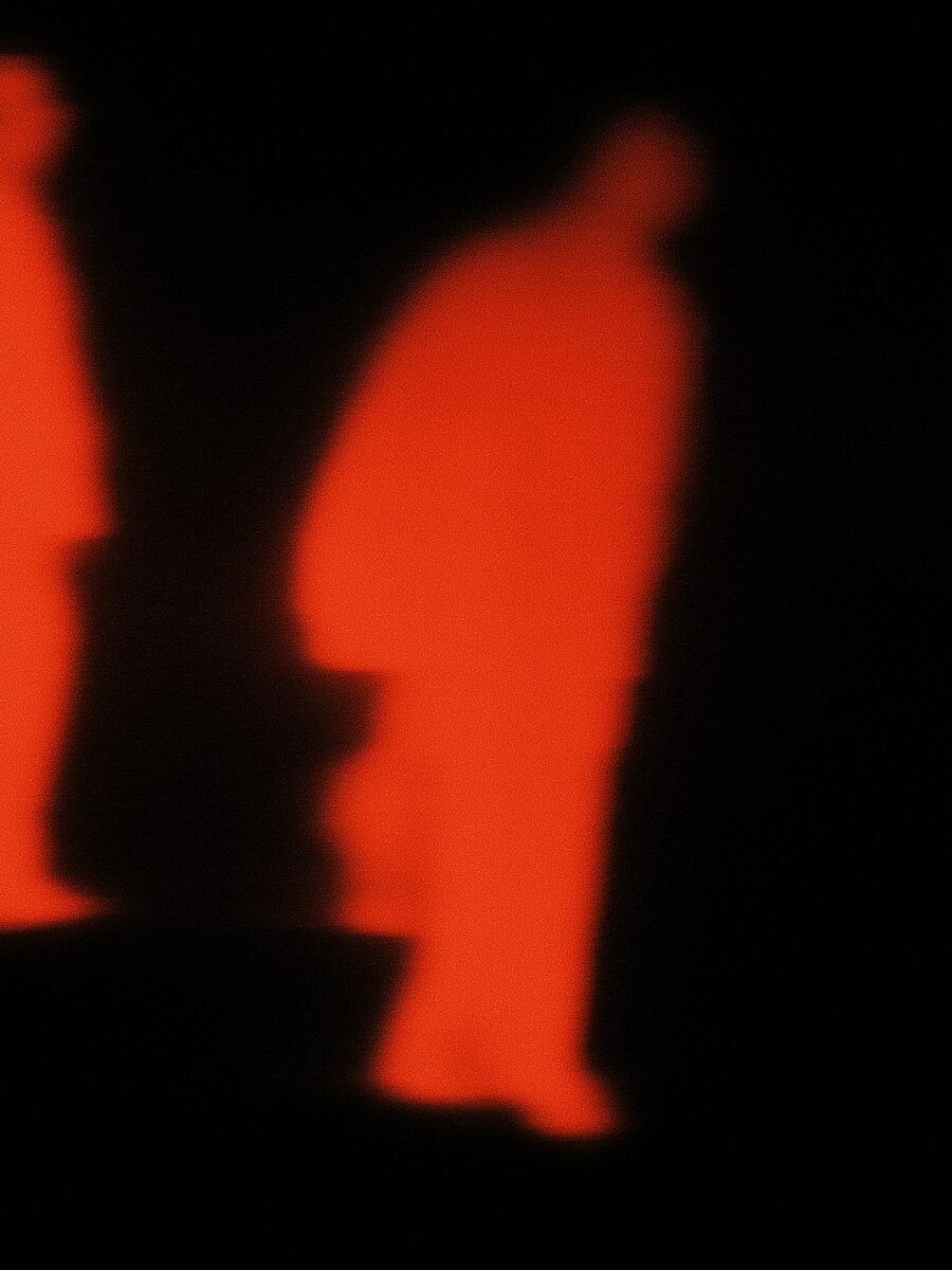 Thermal image of silhouettes against a dark field